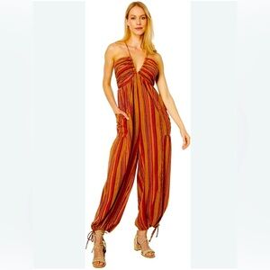 Free People Vibrant Striped Jumpsuit 
Pit to Pit is 14” to 18”